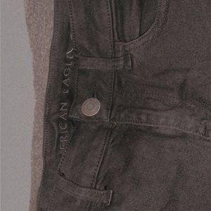 American Eagle jeans with two rips in the knees